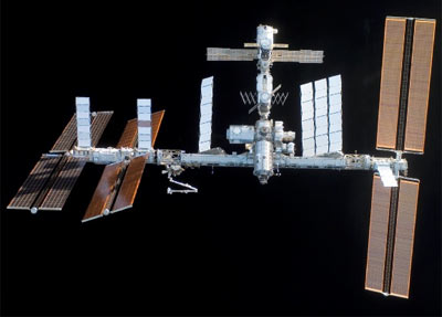 The International Space Station is viewed from space shuttle Discovery after undocking during the STS-120 mission.
